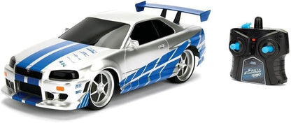 Jada Toys 253206007 Fast & Furious RC-Auto, 2002 Nissan Skyline GT-R, R34, afstandsbediening auto, turbofunctie, 2-kanaals afstandsbediening, USB-oplaadfunctie, incl. batterijen, 1:16, blauw/zilver