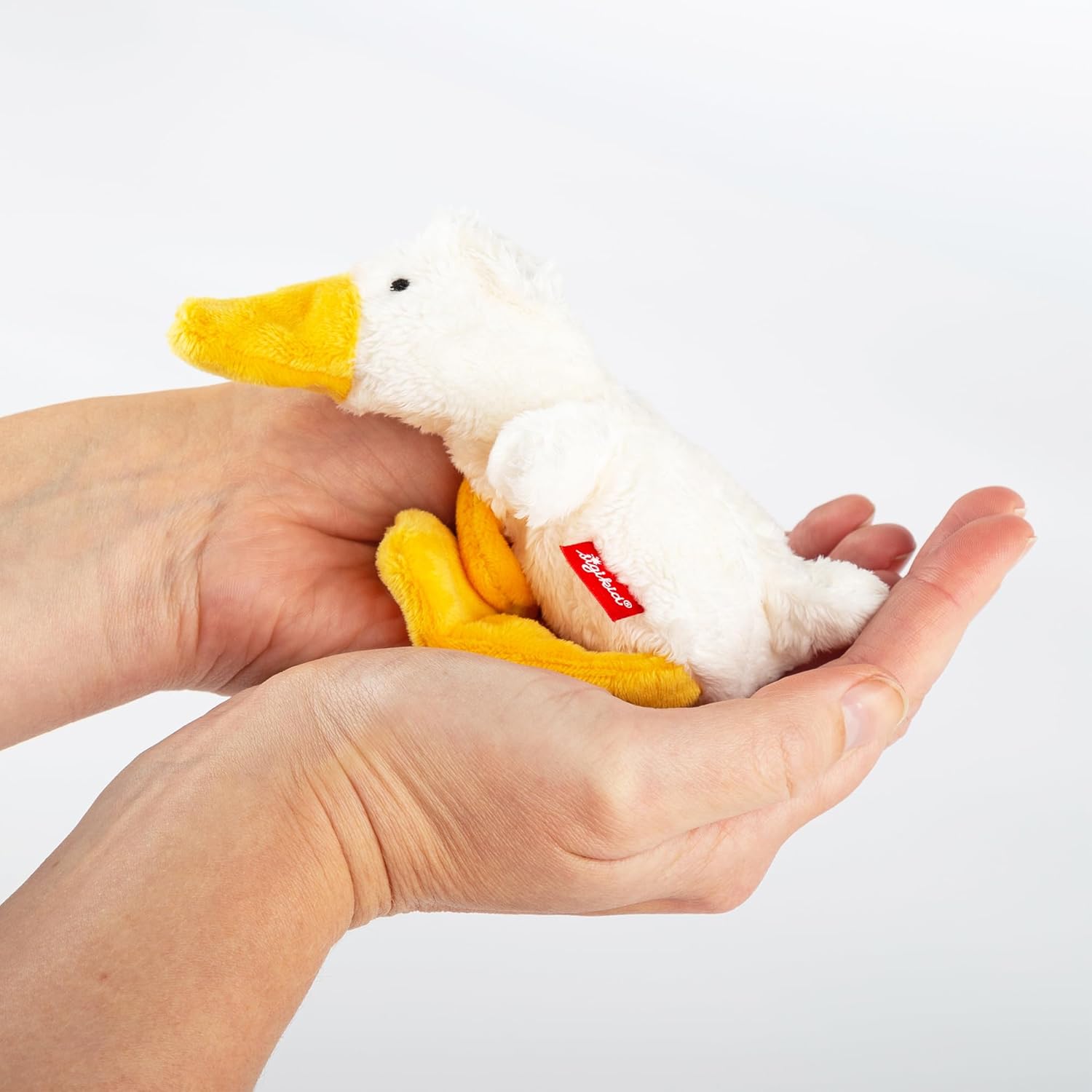 SIGIKID 42594 Mini Ente Cuddly Gadgets Mädchen und Jungen Babyspielzeug empfohlen ab Geburt weiß/gelb