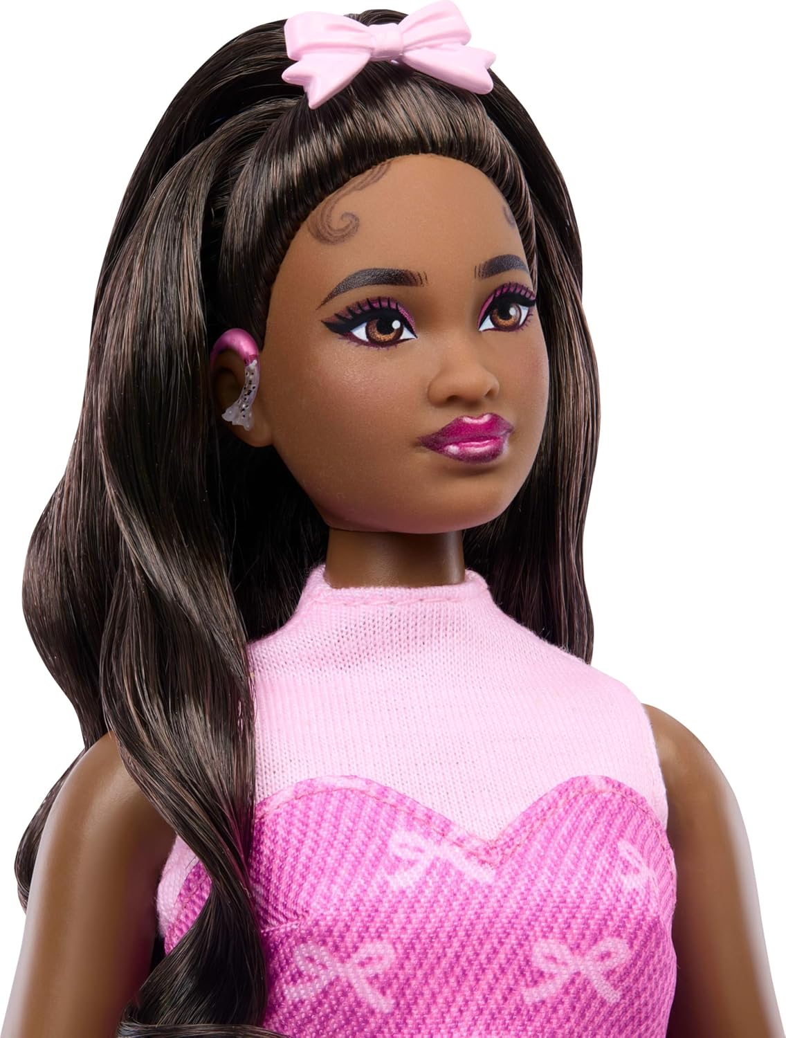 Barbie Deluxe Style Doll #10 in Pink Denim Top and Skirt Set with Bow Print, Black Hair, Behind-the-Ear Hearing Aids and Accessories like Handbag, JJN70