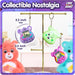 Care Bears Digital Pet - Share Bear Cyber Pet with Care Features, 1.4” inch Screen, Handheld Interactive Virtual Pets for Kids, Collectible Electronic Toy, Battery Included