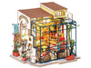 Robotime DG145 Rolife Emilys Blumenladen Miniatur-Puppenhaus aus Holz, Metall, Stoff und Kartonage, Maße: 22 x 15 x 17 cm