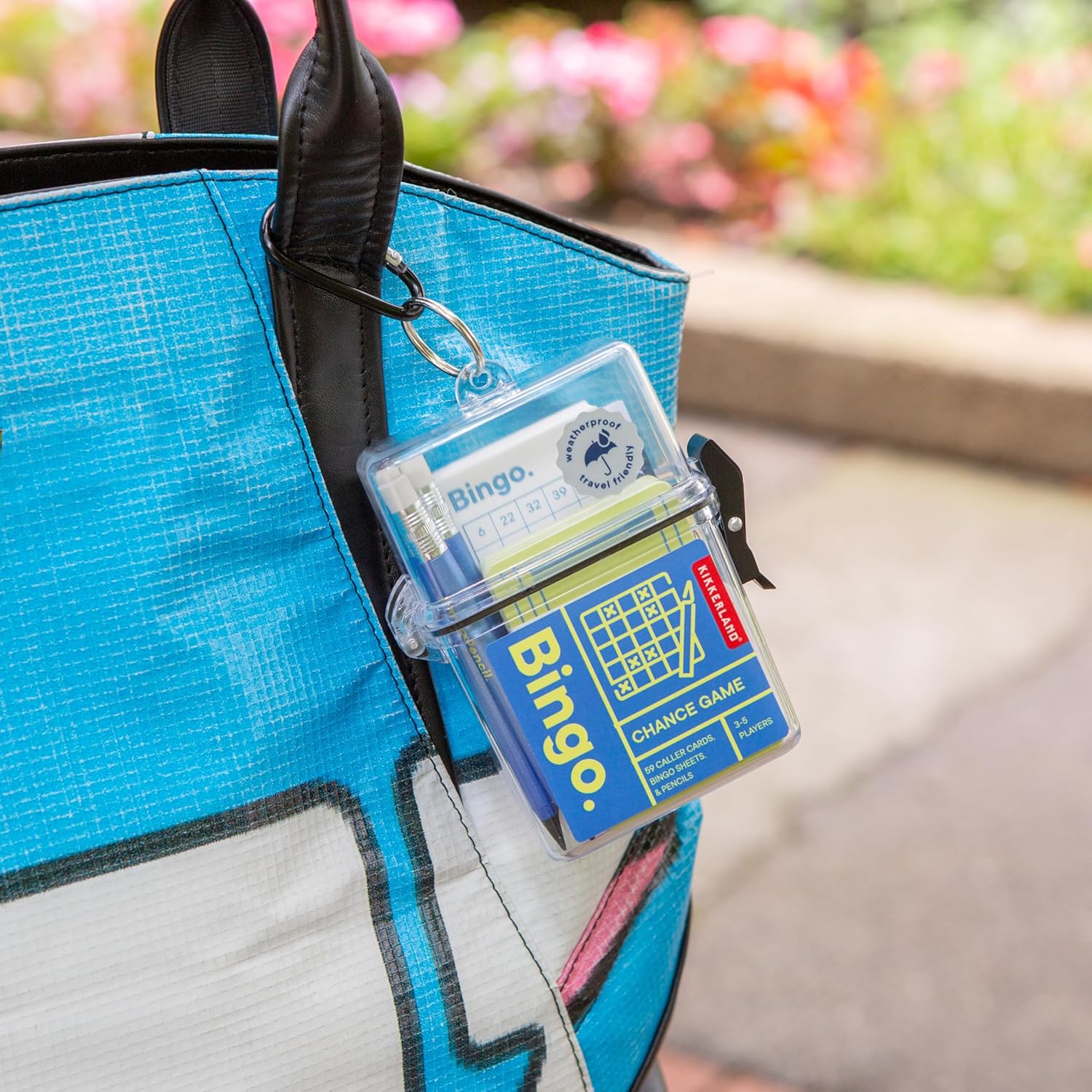 Kikkerland Bingo to Go – Travel Game with Bingo Sheets, Caller Cards, & Waterproof Case – Great for Travel, Camping, & Outdoor Play