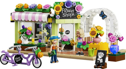 LEGO Friends Creative Flower Shop Toy - Miniature incl. Artificial Flowers, Bouquets, 2 Mini Dolls, Bike & Accessories - Birthday Gift for 7+ Year Old Girls - 42693