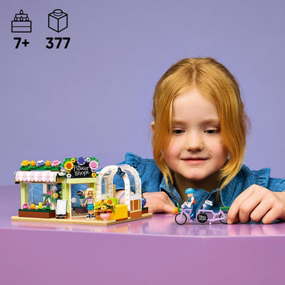 LEGO Friends Creative Flower Shop Toy - Miniature incl. Artificial Flowers, Bouquets, 2 Mini Dolls, Bike & Accessories - Birthday Gift for 7+ Year Old Girls - 42693