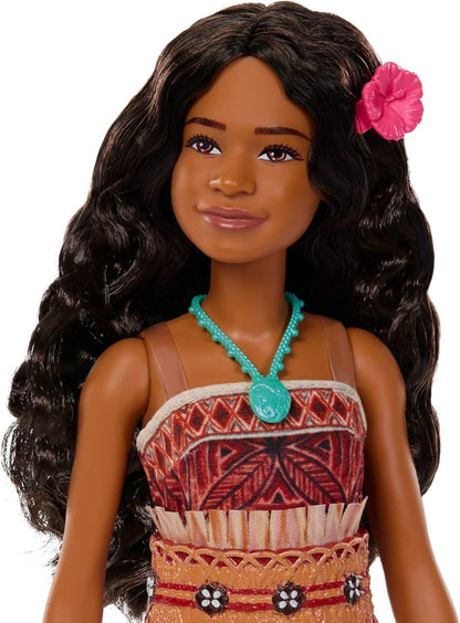 Mattel Disney Speelgoed, Vaiana pop met outfit die aan en uit kan, golvend haar en 4 accessoires, beweegbaar verzamelobject, geïnspireerd op live-actionfilm, JLV15