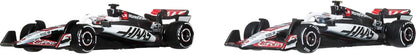 Hot Wheels Premium Formula 1 Toy Cars, 2 1:64 Scale Die-Cast MoneyGram Haas F1 Team Esteban Ocon & Oliver Bearman Racecars with Real Riders Tires, JMM97