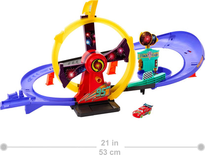Mattel Disney Pixar Cars Toy Track Set with Light-Up Lightning McQueen, Race to Celebrate Celebration Raceway Playset with Loop & Wind-Up Kicker