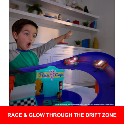 Mattel Disney Pixar Cars Toy Track Set with Light-Up Lightning McQueen, Race to Celebrate Celebration Raceway Playset with Loop & Wind-Up Kicker
