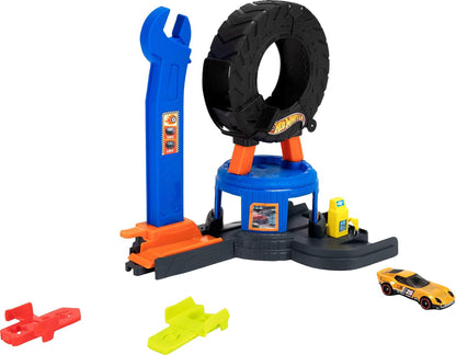 Hot Wheels Spielzeugauto-Trackset, City Downtown Reifenwerkstatt und Die-Cast-Abschleppwagen im Maßstab 1:64, multidirektionales Spielen, mit dem Track-Schnellstecksystem kompatibel, JHL75