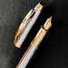 Sheaffer 100 - Refillable fountain pen, medium nib, Chrome w/Gold finish, gold tone trim