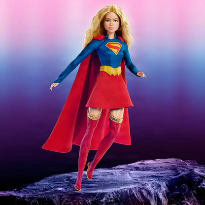 Barbie Signature DC Supergirl Fashion Doll, Blonde with Super Hero Costume & Cape, Collector Doll in Displayable Packaging & Doll Stand, JJY04