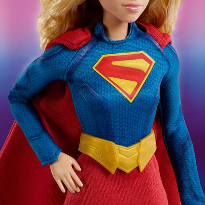 Barbie Signature DC Supergirl Fashion Doll, Blonde with Super Hero Costume & Cape, Collector Doll in Displayable Packaging & Doll Stand, JJY04