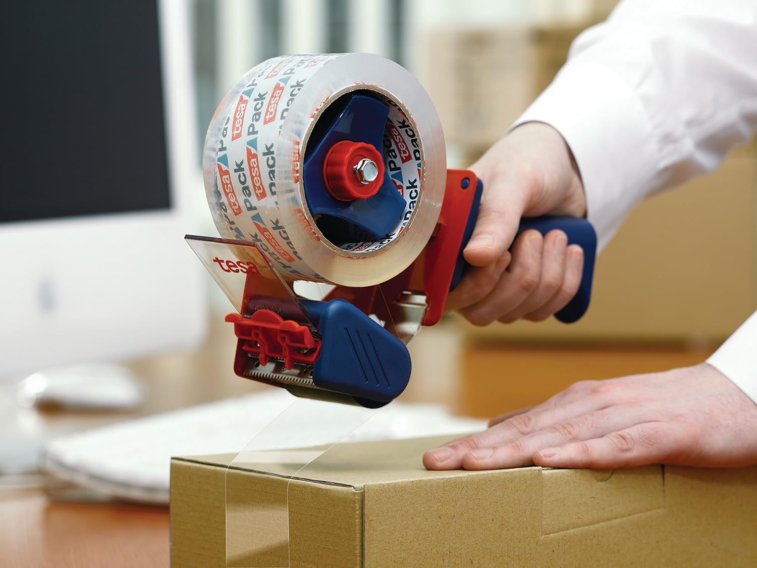 tesa Packing Tape Hand Dispenser Economy - Robust Dispenser for Parcel Tapes - Professional Quality - for Tapes up to 50 cm Wide