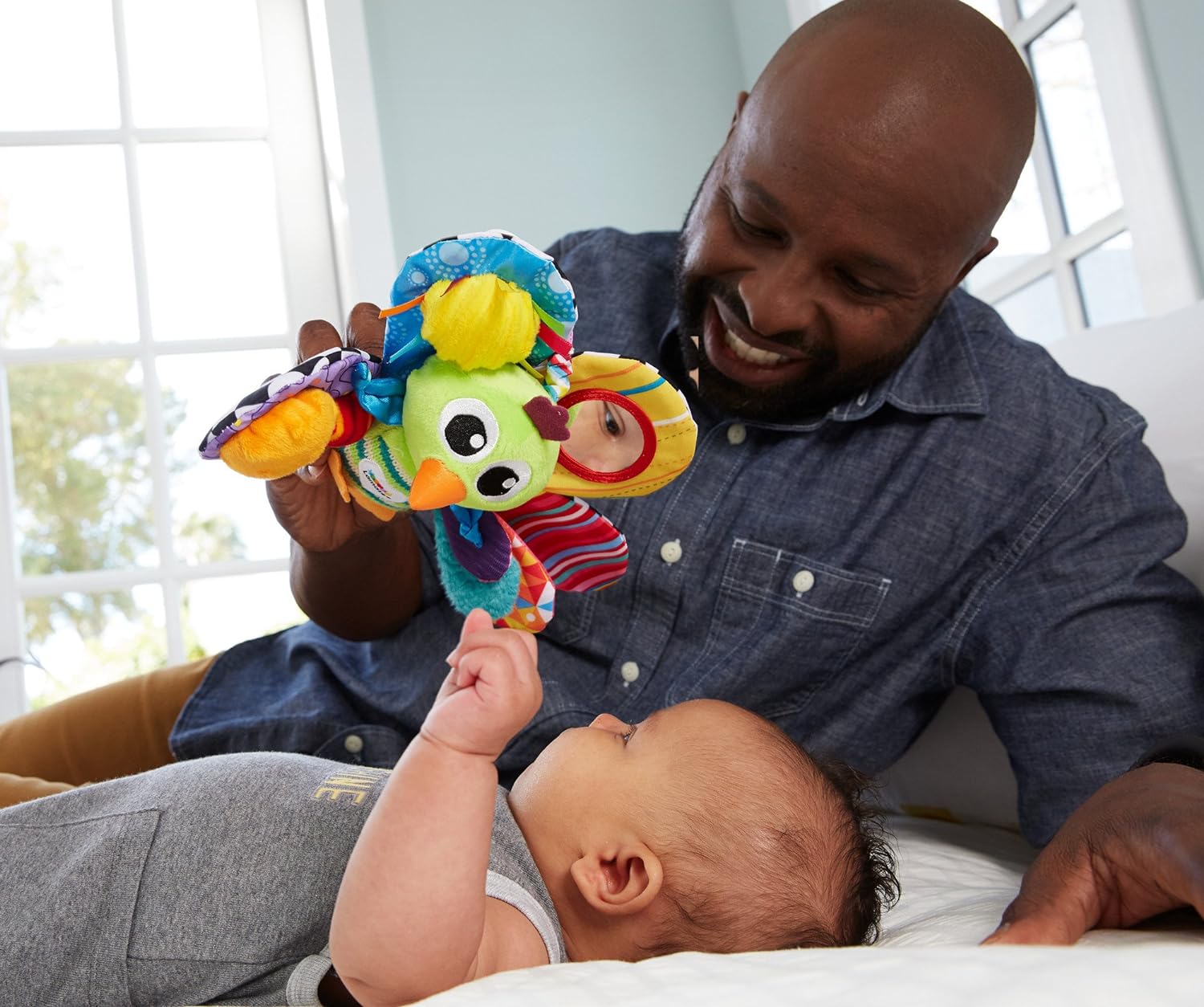 LAMAZE Jacques the Peacock, Clip on Pram and Pushchair Newborn Baby Toy, Sensory Toy for Babies Boys and Girls from 0 to 6 Months