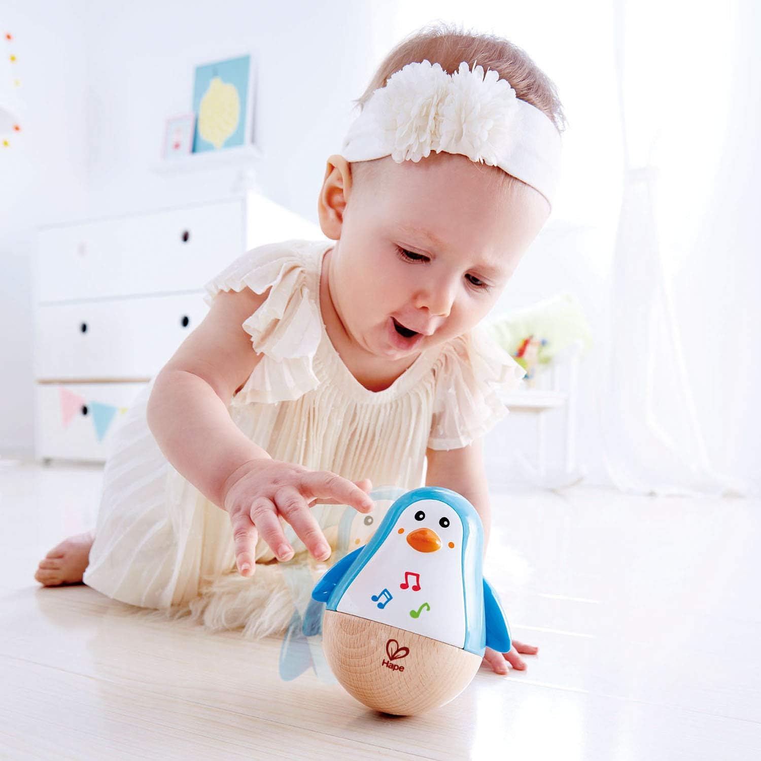 Hape Penguin Musical Wobbler | Colourful Wobbling Melody Penguin, Roly-Poly Toy for Kids 6 Months+