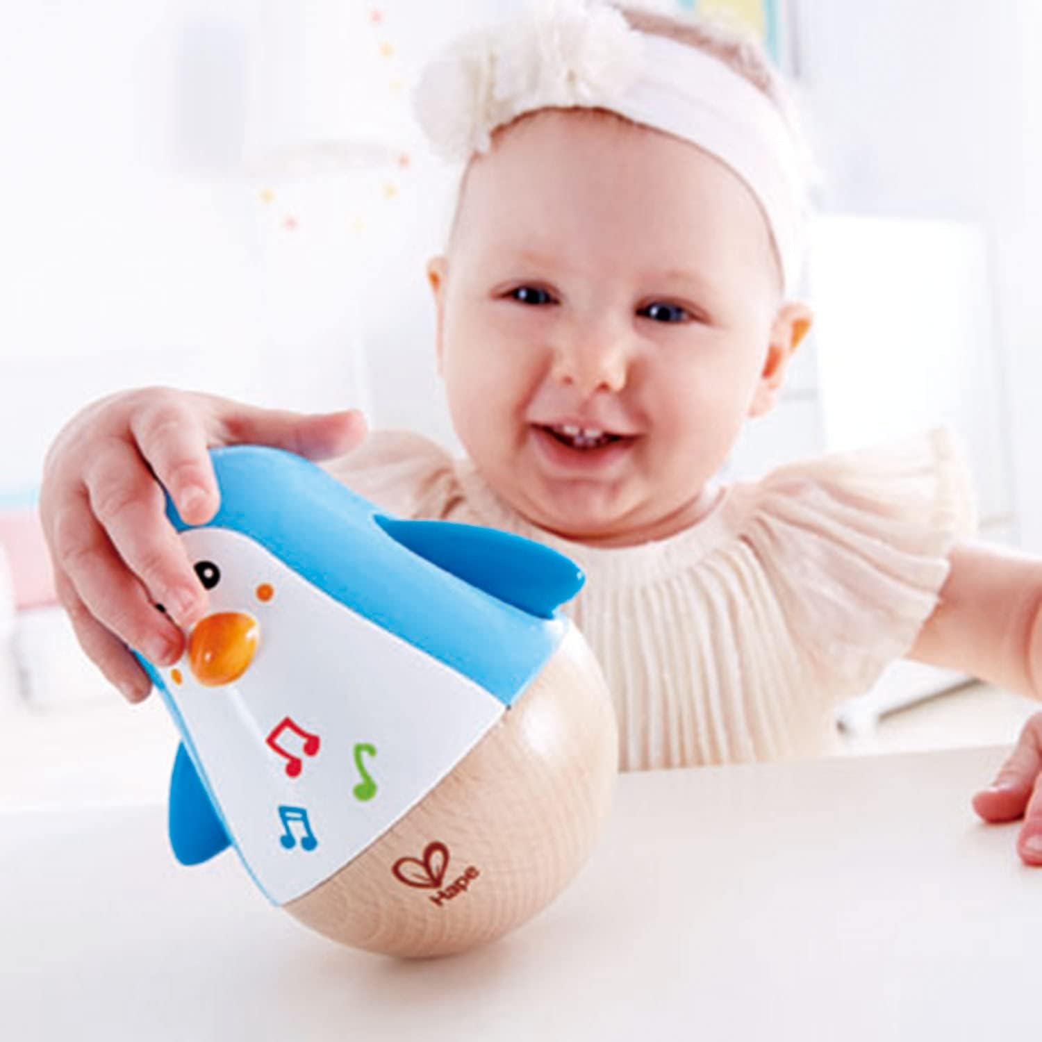 Hape Penguin Musical Wobbler | Colourful Wobbling Melody Penguin, Roly-Poly Toy for Kids 6 Months+