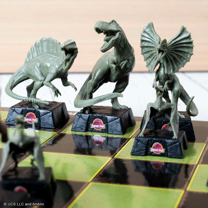The Noble Collection Jurassic Park Chess Set - 32 Highly Detailed Plastic Chess Pieces - Officially Licensed Jurassic Park Film Set Movie Game Gifts