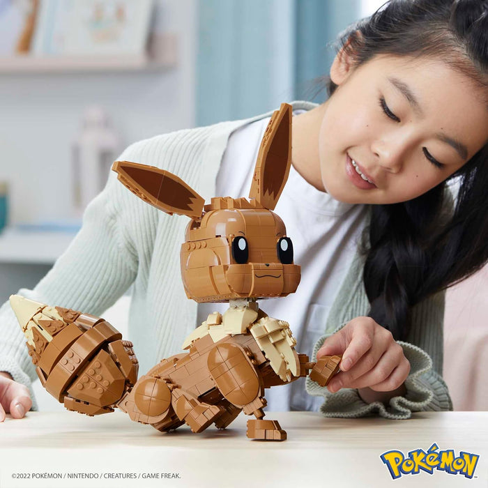 Mega Construx GMD34 - Pokémon Jumbo Evoli 30cm, Bauset mit beweglicher Figur & POKÉMON - detailgetreue und feuerspeiende Glumanda-Figur zum Zusammenbauen, Bauspielzeug für Kinder ab 6 Jahren, GKY96