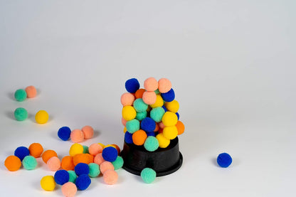 Monikers The Fuzzies - A game to create an impossible gravity defying tower of fuzzy balls for ages 6 to Adult