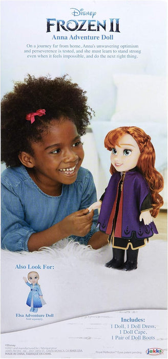 Disney Frozen 2 Anna Travel Doll – 14” / 35cm Tall Articulated Doll Dressed in Iconic Fashion Dress, Violet Cape and Has Long Flowing Hair for Extra Play, For Girls Aged 3+
