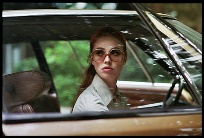 The Lady in the Car with Glasses and a Gun