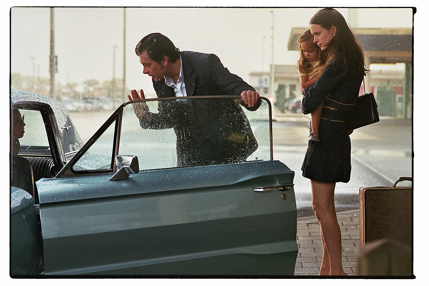 The Lady in the Car with Glasses and a Gun