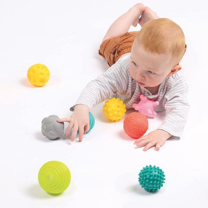 LUDI Set mit 8 Bällen für frühe Entwicklung Gemischte sensorische Bälle | Verschiedene Formen und Farben | Weiches Plastik | Ab 6 Monaten