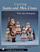 Carving Santa and Mrs. Claus