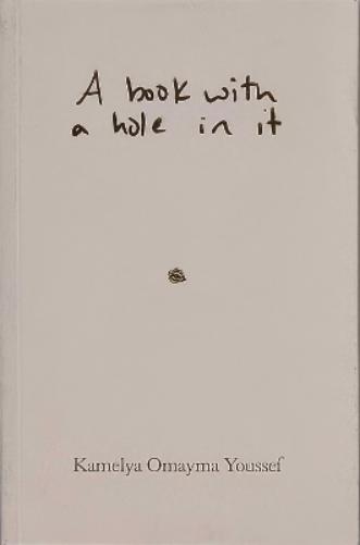 A book with a hole in it
