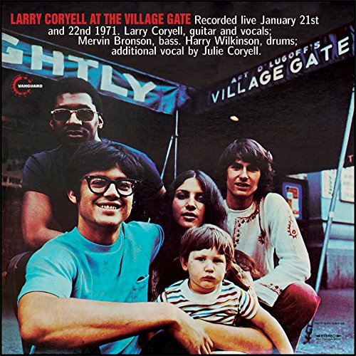 AT THE VILLAGE GATE