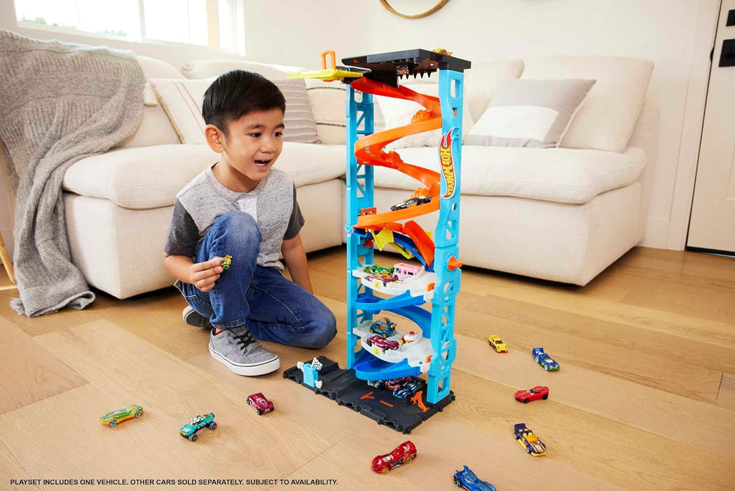 Hot Wheels City Racetrack, Transforming Race Tower, 2-in-1 Tower Mode or Race Mode for Single or Dual Racing, Includes 1 Toy Car in 1:64 Scale, Toys for Ages 3 and Up, One Pack, HKX43