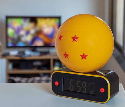 Teknofun - Reloj Despertador Inalámbrico Dragon Ball Z - Bola de Cristal - Multifunción - Da Tiempo, Música y Decoración - Amarillo, Negro y Naranja- USB
