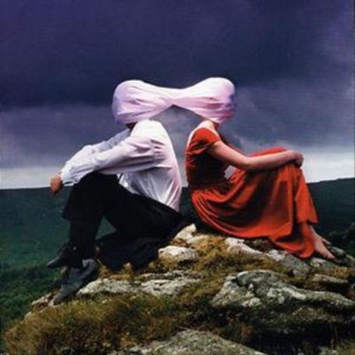 Casually Dressed and Deep in Conversation